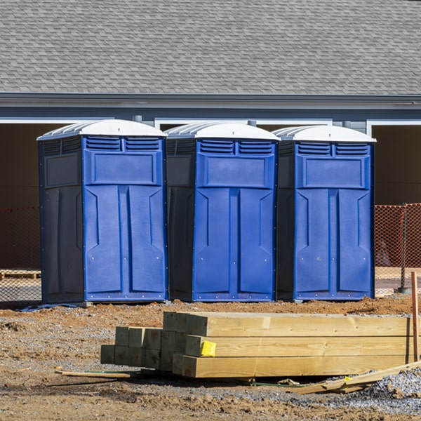 what is the cost difference between standard and deluxe portable toilet rentals in Crab Orchard